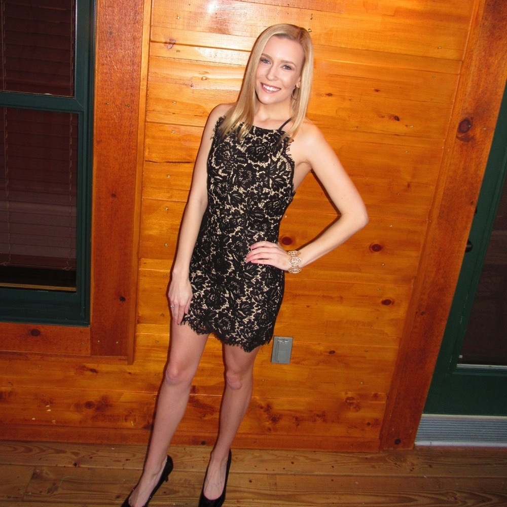 Lace nude and black dress that goes above the knee